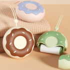 Donut-shaped portable lint remover